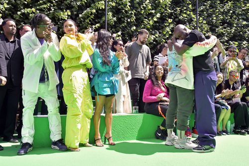 Abloh and West embrace at the Louis Vuitton Mens SS19 finale - a moment solidifying urban inclusion in high fashion. Also pictured: (l to r) Travis Scott, Kylie Jenner, Kim Kardashian and Jordyn Woods