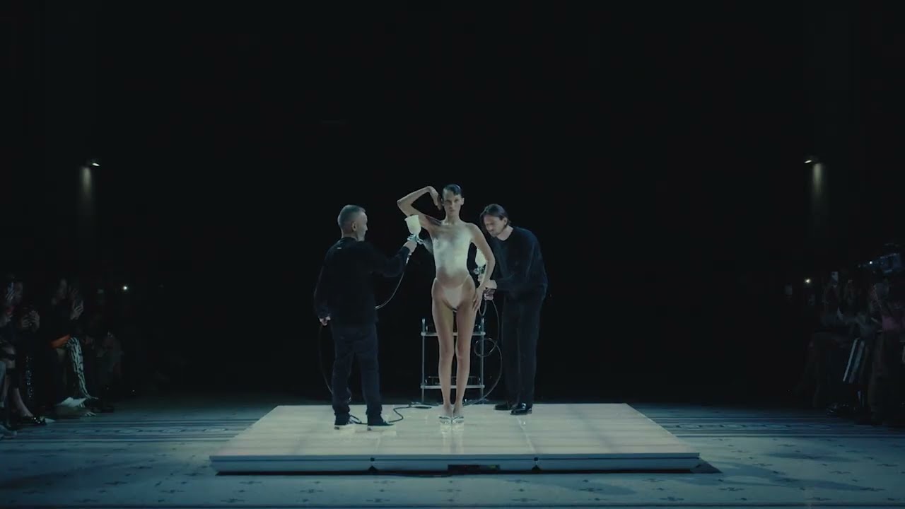 Dress sprayed onto model on Coperni runway at Paris Fashion Week