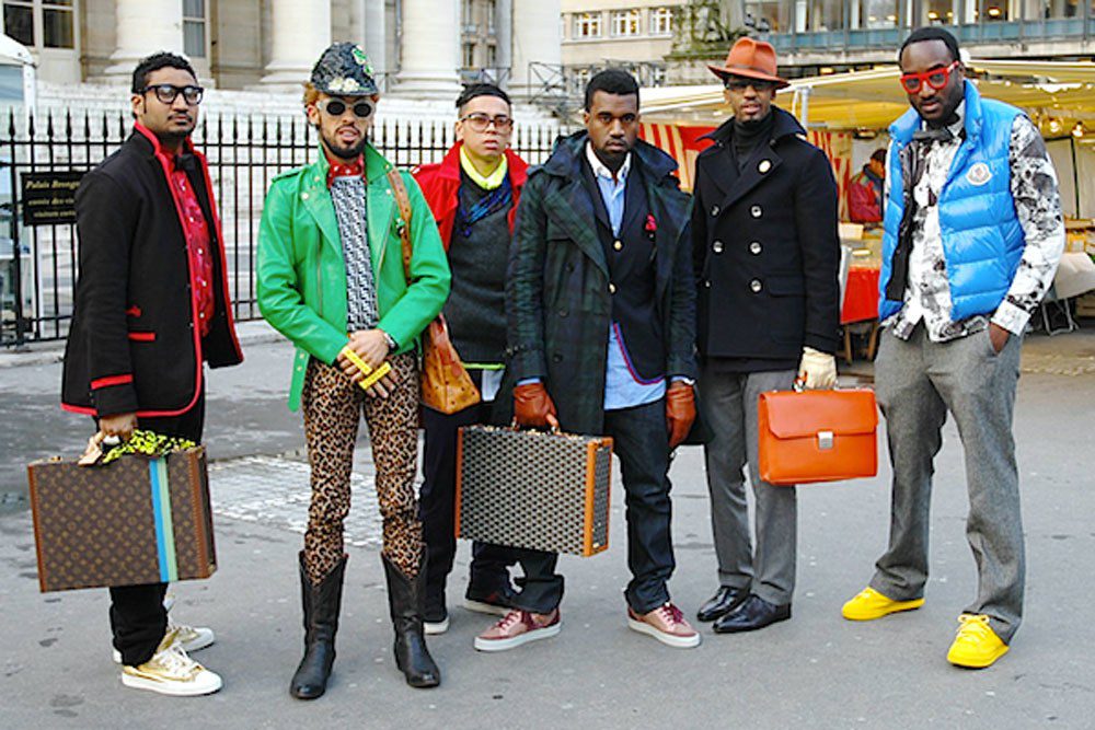 Virgil Abloh (right) as part of Kanye West’s creative team attending 2009 PFW
