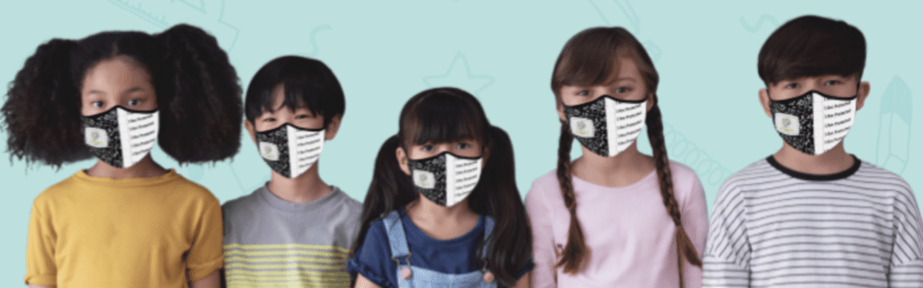Photo of children with masks on their face in front of blue background