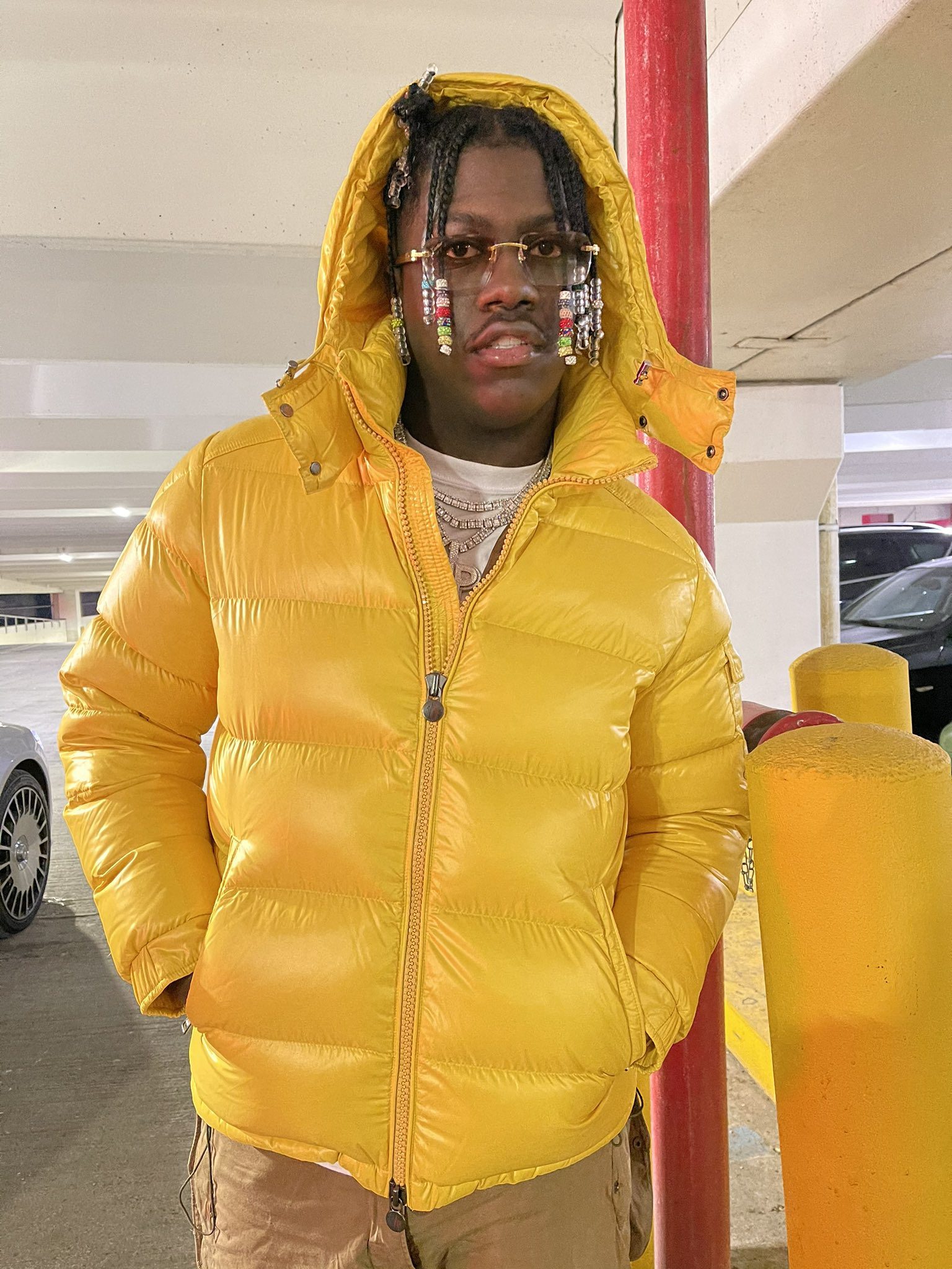 Photo of Lil Yachty in yellow bubble coat