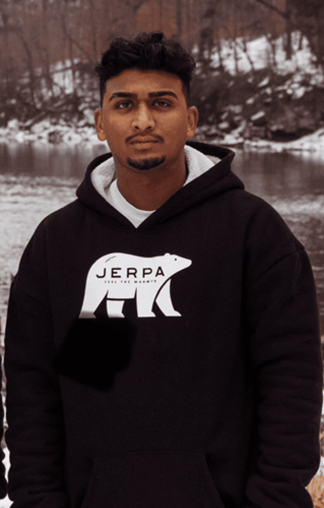 Photo of Founder of JERPA Austin Thomas wearing Sherpa-lined Hoodie in Black
