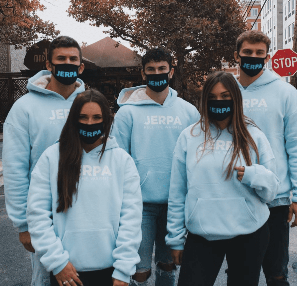 Photo of five ambassadors wearing JERPA goodie in light blue with JERPA masks