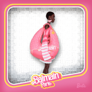 Barbie avatar complete with a striped sweater dress and a massive pillow bag featuring Balmain's signature logo in Barbie script.