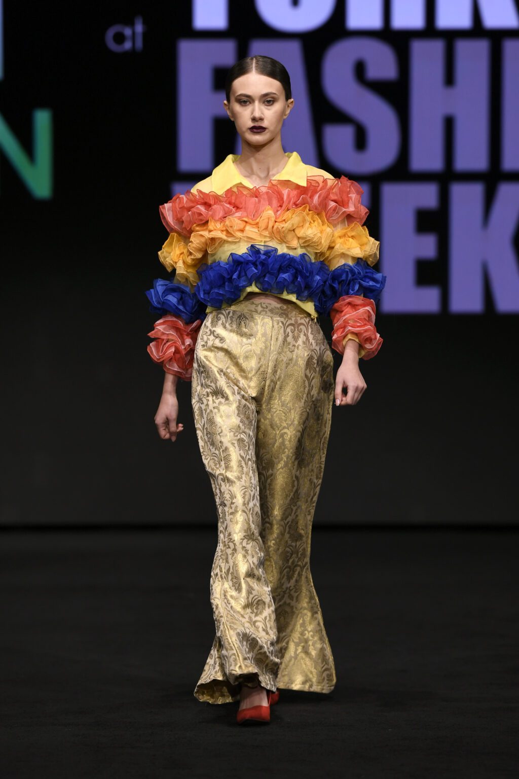 NEW YORK, NEW YORK - FEBRUARY 12: Sadi Karawalks the runway wearing INIFD-LST India Fashion Trunk - At New York Fashion Week Powered By Art Hearts Fashion at The Ziegfeld Ballroom on February 12, 2022 in New York City. (Photo by Arun Nevader/Getty Images for Art Hearts Fashion)