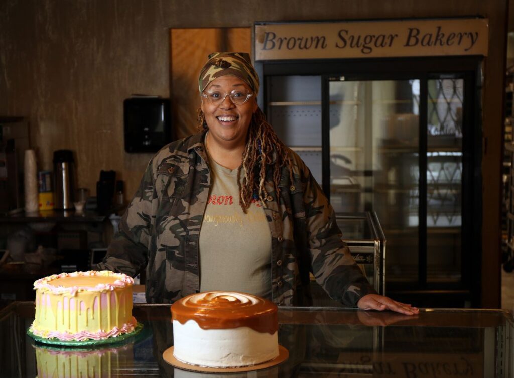Brown Sugar Bakery owner, Stephanie Hart, with some of her cakes.