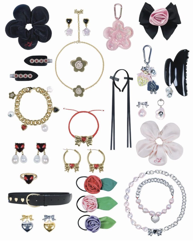 A collection of accessories from Sandy Liang that consist of pearl necklaces, flower scrunchies and headbands with bow details. 