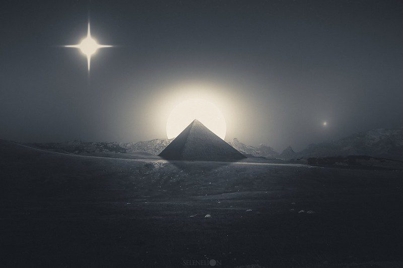 rising sun behind a pyramid in a dark landscape, a recurring symbol in 3 Body Problem