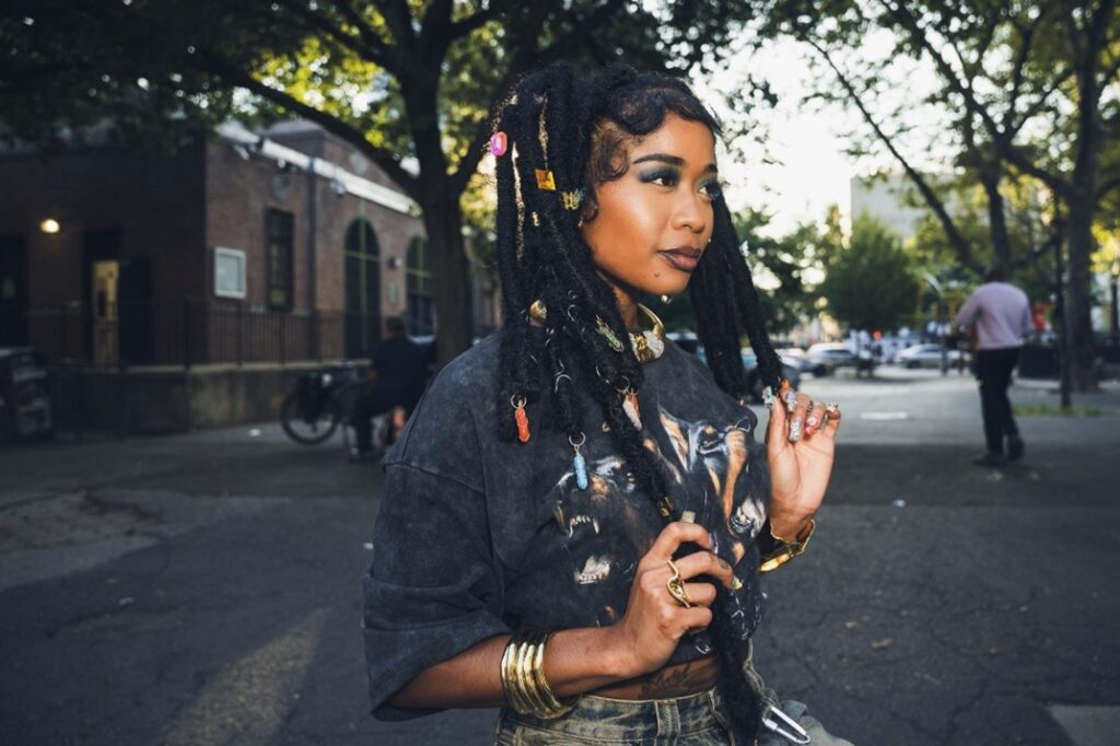 Rap Phenom TiaCorine Shines With 